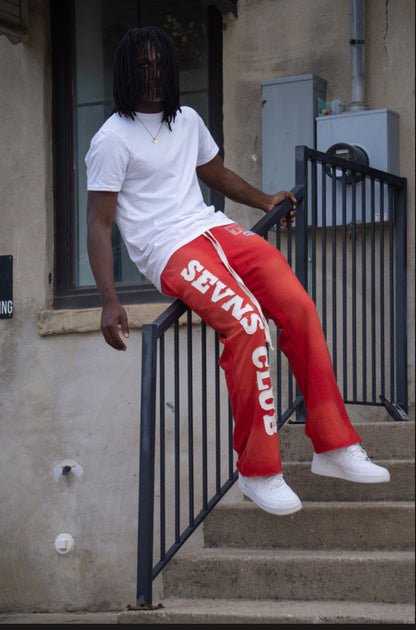 Red flared joggers